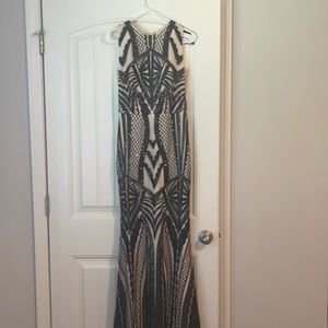 Formal nude and black gown size 4